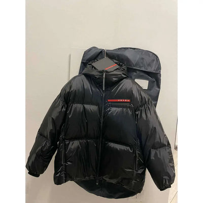 PRADA - OVERSIZED RE-NYLON PUFFER JACKET